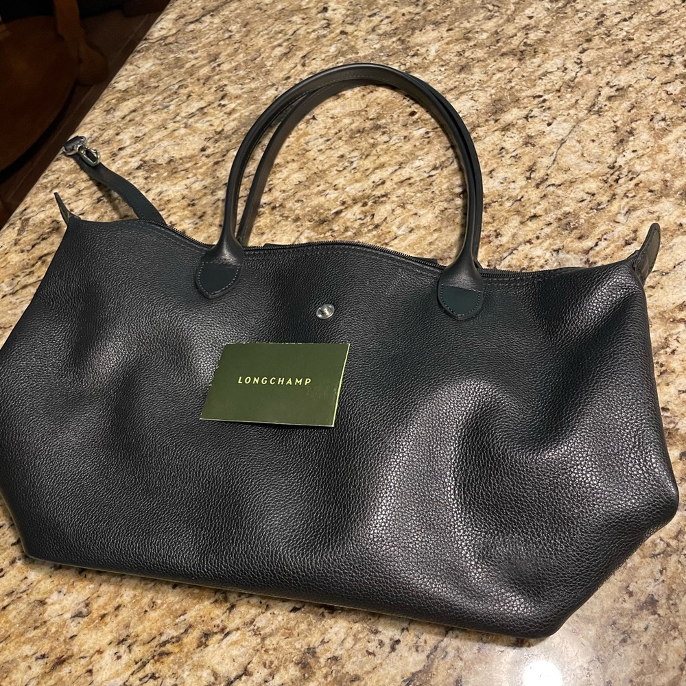 Longchamp leather tote. Near perfect condition- pebbled leather. Very classic.